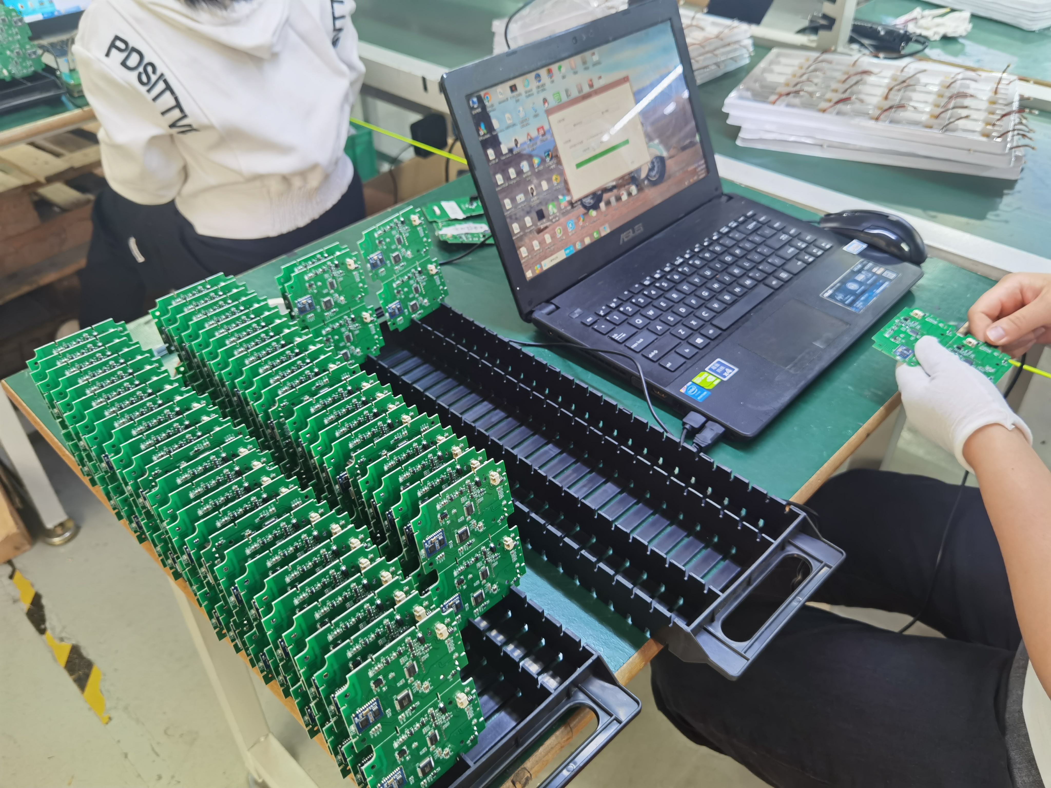 HFSecurity production line — fingerprint device assembly and testing